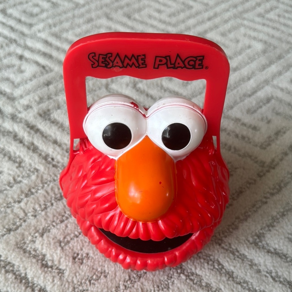 Sesame Place Elmo container with handle